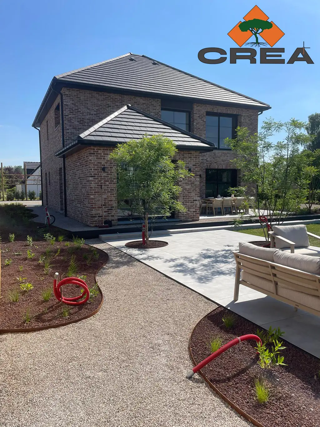 Chantier Gavrelle 3 Terrasse grés ceram + arbre et acier corten