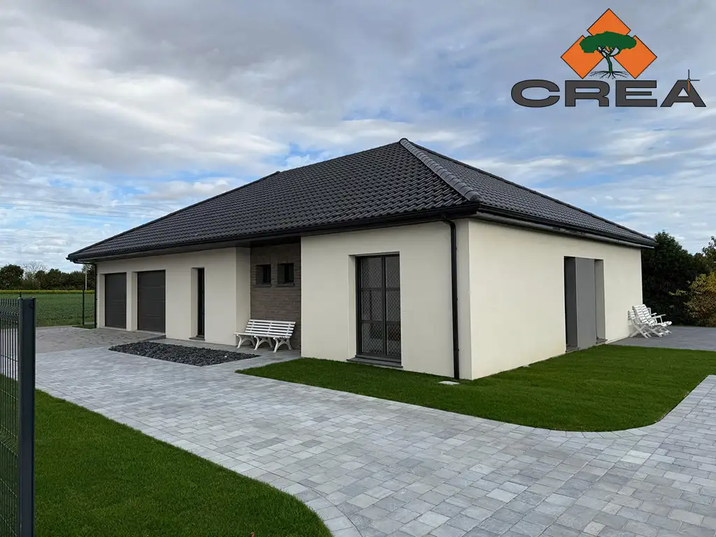 Comment l'aménagement extérieur redéfinit la rénovation de maison autour d'Arras ? 1 Pierre bleue + gazon placage + clôtures 3